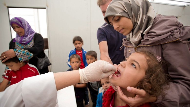A Syrian refugee receiving vaccination in Lebanon