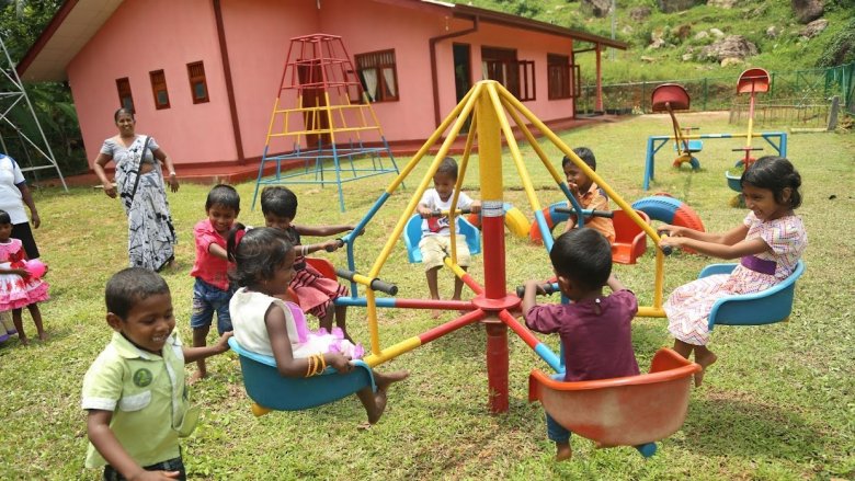 Image Photo of children playing at an ECD center in Sri Lanka Students in the playground of their early childhood development
