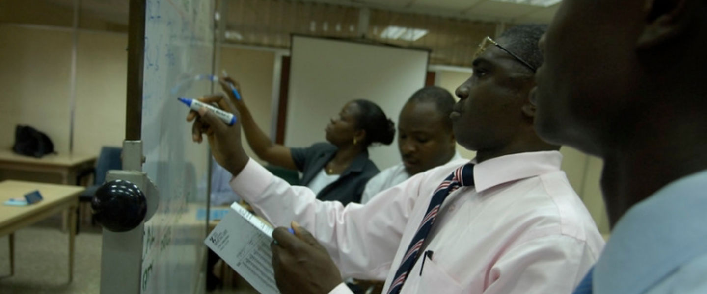 Business people at work in Ghana