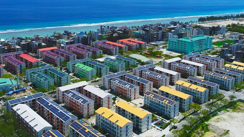 Aerial view of a 1.5 Megawatt solar PV installation project on the rooftops. Humale, Maldives