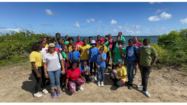 Daniel (second from the left in the second row) and other participants of the Afterschool Environmental Ambassadors Program