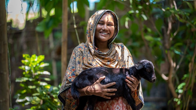 Picture of woman holding a lamb