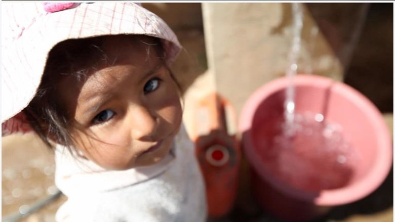 Bolivia-Child-Public Water Station