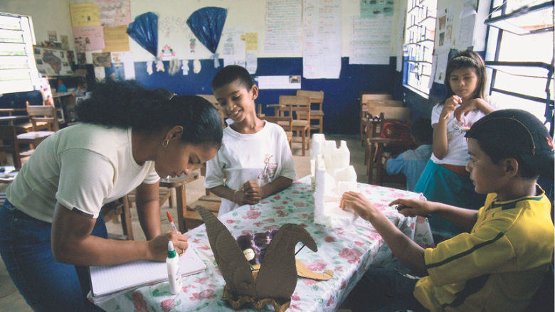 Teacher with students