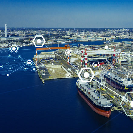 Aerial view of a busy industrial port with cargo ship and cranes, overlaid with digital network icons representing data conne