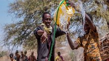Men fetch water in the county of Wajir in North Eastern Kenya