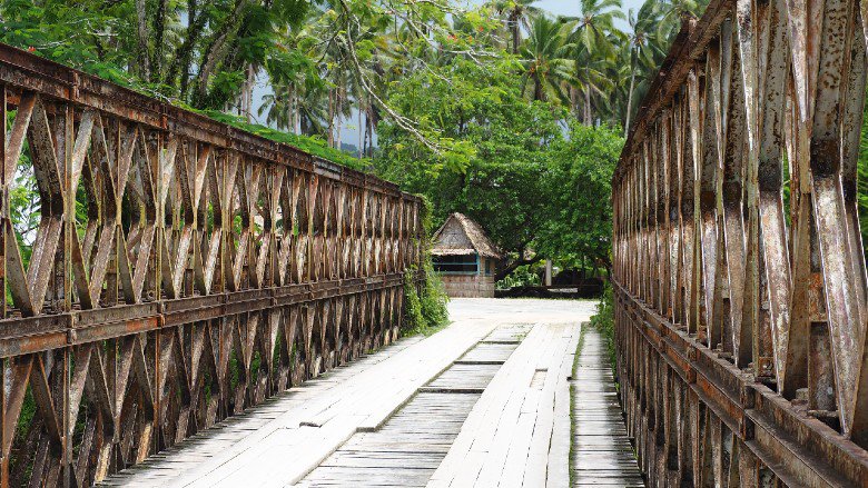 A modular bridge leads to a house in Solomon Islands to offer an opportunity to increase climate resilience 