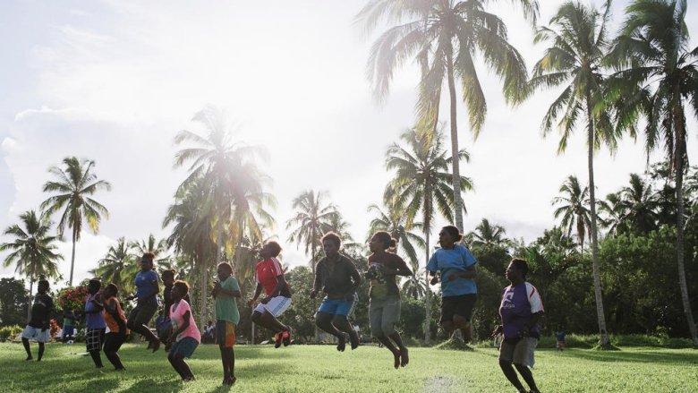 Group of people jumping in PNG
