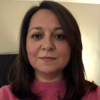 Femail wearing a pink top