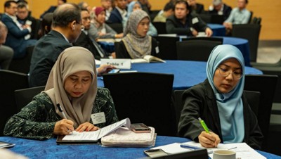 Workshop participants taking notes