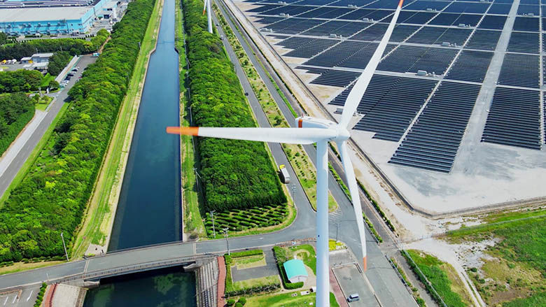 Photo of a wind turbine and solar panels