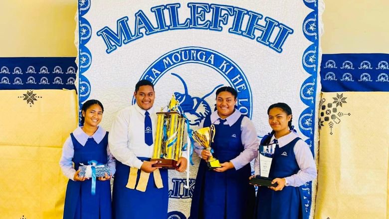 Folau (second from the left) celebrates with friends from Mailefihi College, in Vava’u.