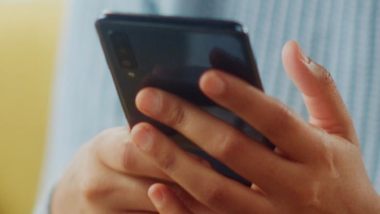 A smartphone held in someone's hands