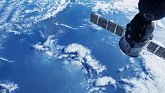 Stock photo of a satellite above the earth