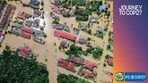Aerial view of a flooded village. Photo: Milind Ruparel/Unsplash