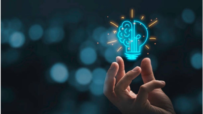 image representing a good idea with an illustration of a lightbulb mixed with a brain  floating above a hand
