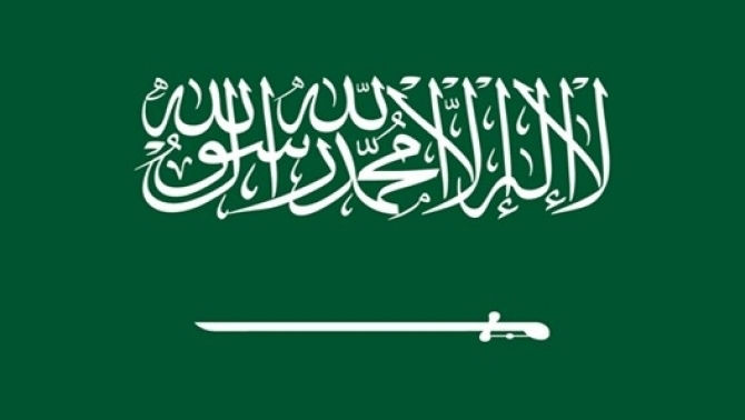 Green flag with white Arabic writing
