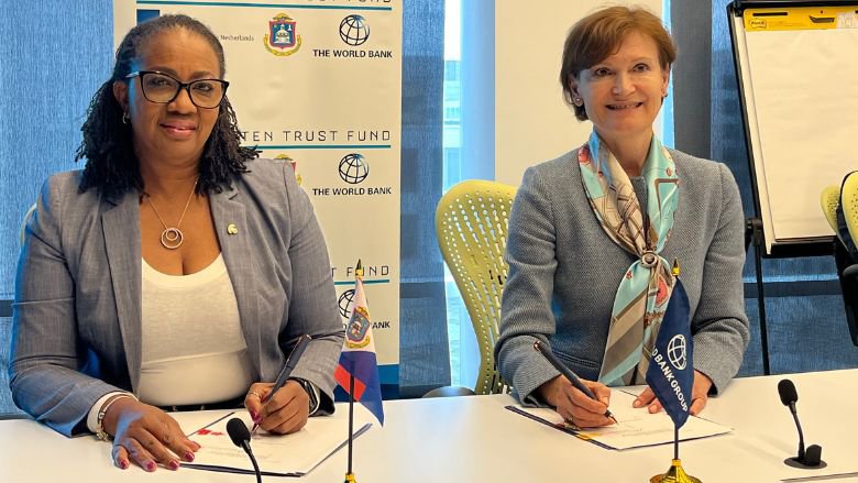 L-R-PM-Jacobs-and-WB-Caribbean-Director-Lilia-Burunciuc-Sign-Additional-Financing-Agreement