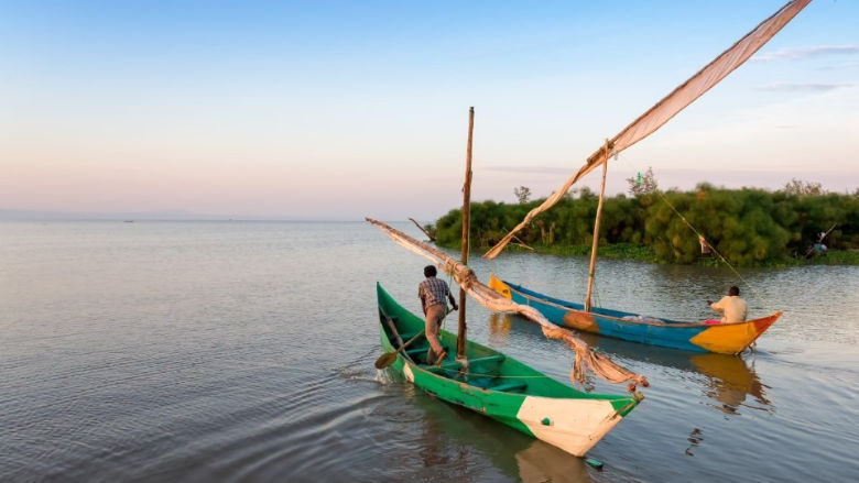 Fishermen canoe on Lake Victoria