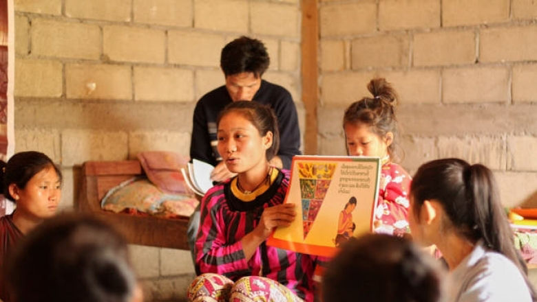 An Khmu trainer explains to new moms the importance of nutrition and exclusive breast feeding