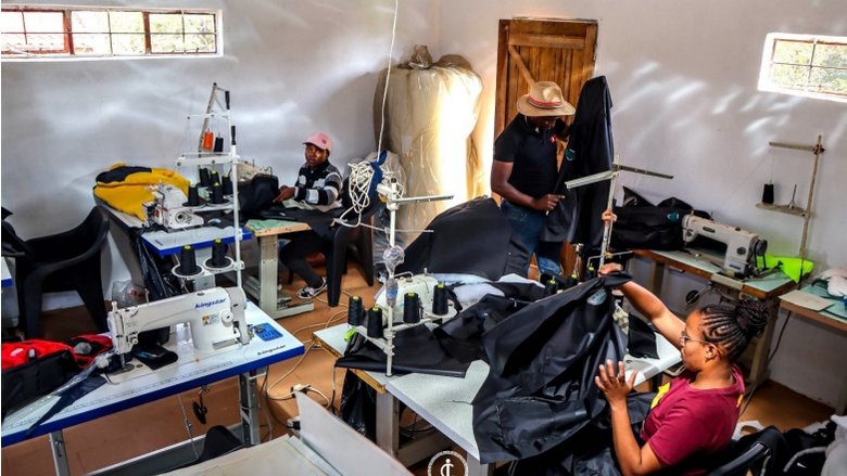 Workers sewing garments in Lesotho business