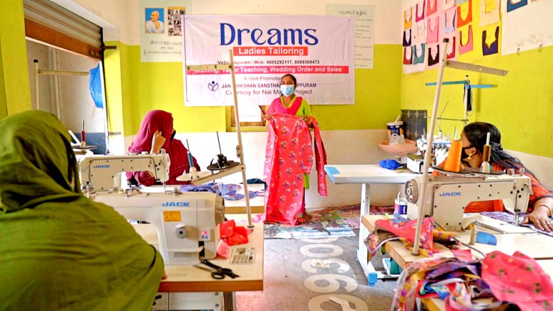 Picture of Nai Manzil beneficiary working in her tailoring workshop