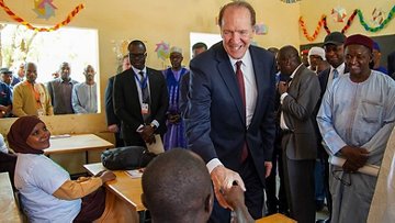 President Malpass with students in Niger