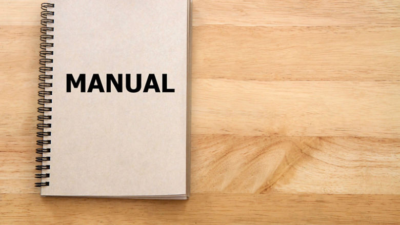 User manual or Instruction manual book on wooden desk