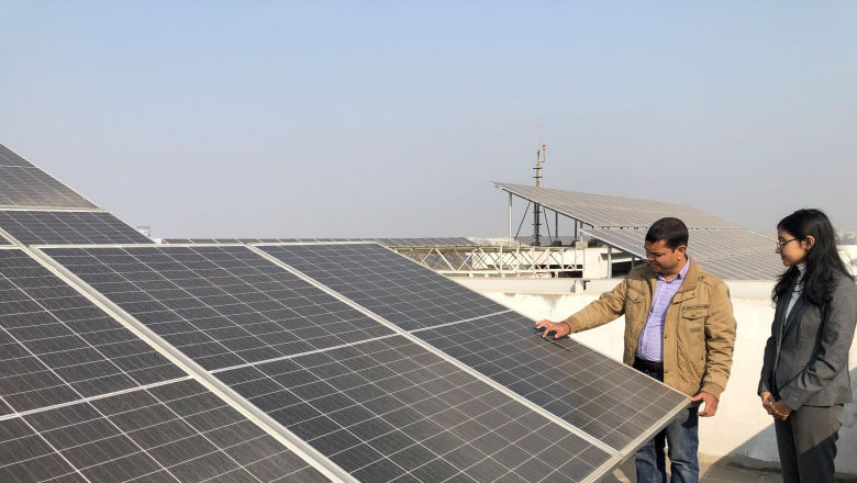 woman with solar panel