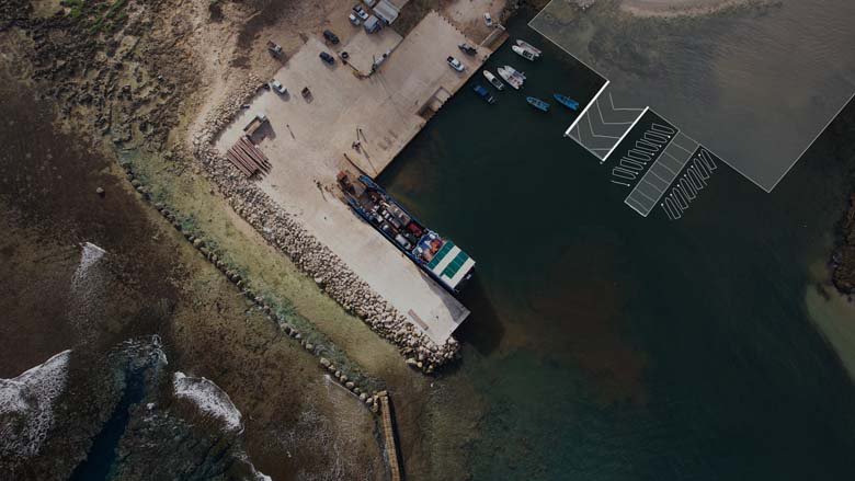 The newly-reconstructed wharf on ‘Eua island, Tonga – with a visualization of a new jetty for small vessels which is still to