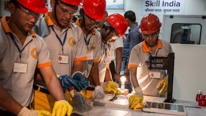 Photo of trainees receiving practical learning at a skills center in Okhla, Delhi.