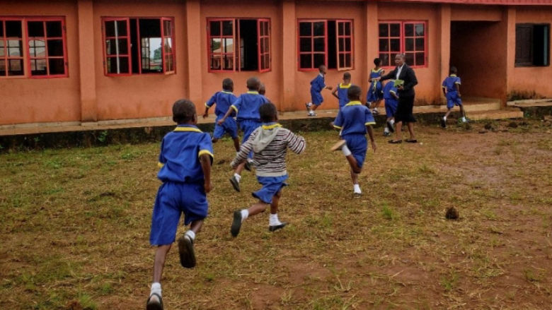 Pupils enter school buildings in Edo State, Nigeria
