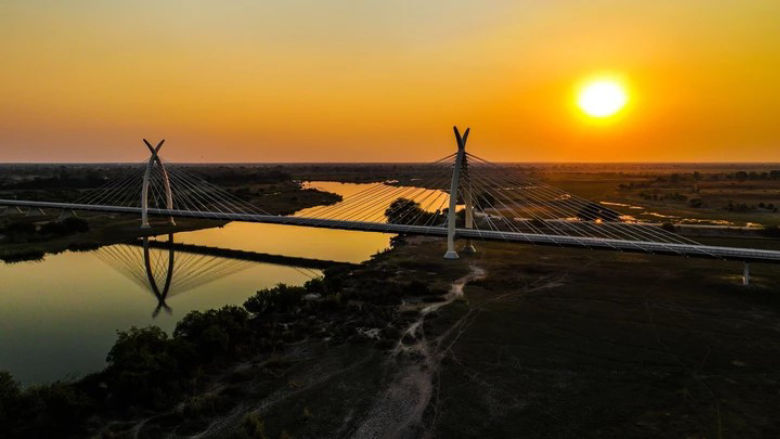 Sunset at the Okavango River bridge in Botswana, Africa Botswana Blog GDF