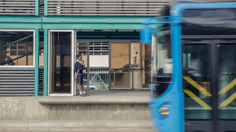 A bus arrives at a BRT station in Dar es Salaam, Tanzania.