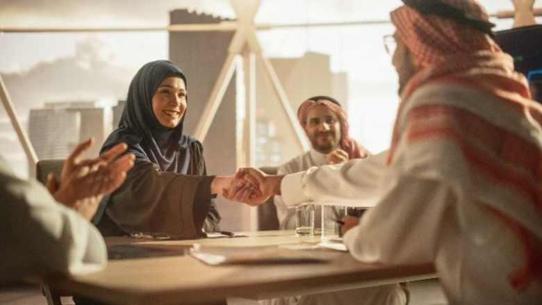 Gulf Economic Update - Woman Shaking hand