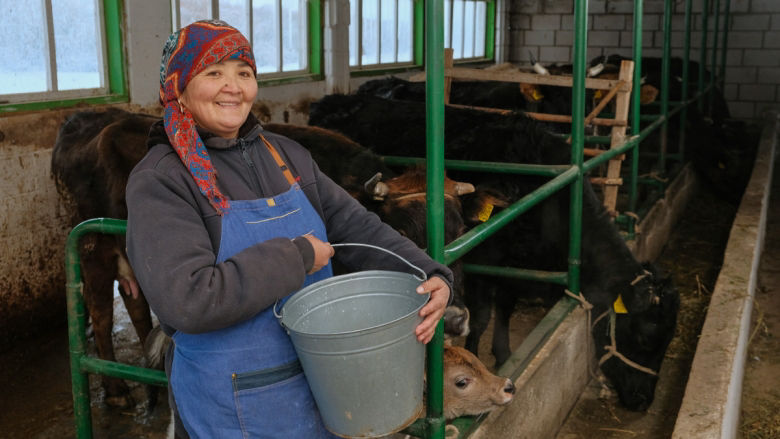 Zamira Makeyeva, a dairy farmer, in her cow shed.