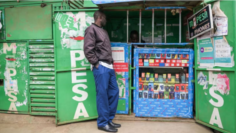 Man standing in front of merchant