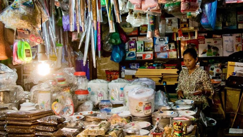 Cambodian woman entrepreneur in a small shop