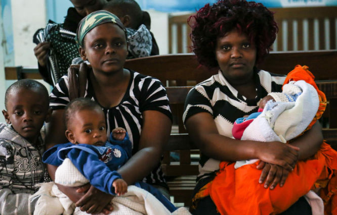 Mothers and their young children wait to be seen by a doctor at the Mama Lucy Kibaki Hospital in Nairobi. 