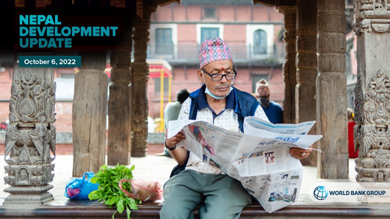 A man reads newspaper in Kathmandu, Nepal