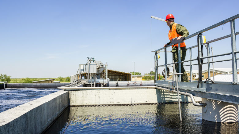 an engineer checks a water reuse plant