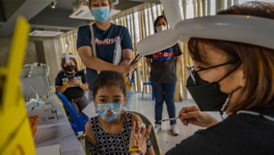 Delivering COVID 19 Vaccines To The Last Mile In The Philippines   Ph Filipino Child Getting Covid 19 Vaccine