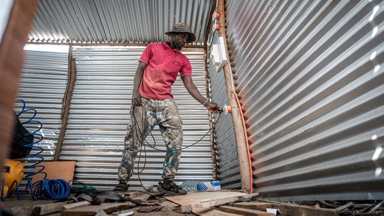 Carpenter Djaraf using the electric plug for his works. Credit: LayeproPhotos / World Bank. Senegal closing on universal electricity access - NaijaAgroNet