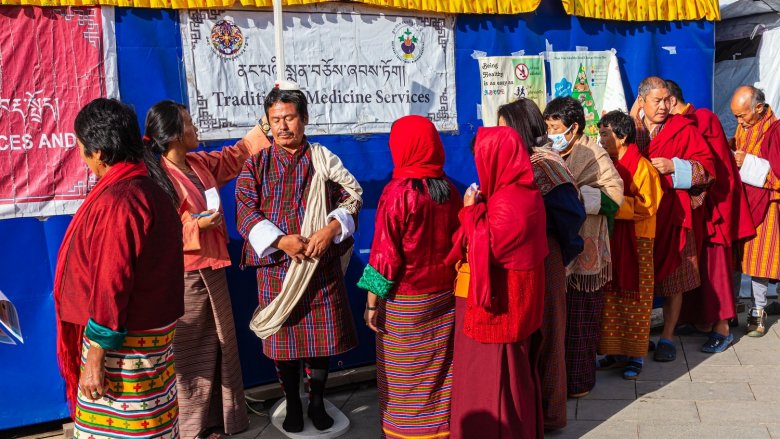 Paro, Bhutan - Health check before a Buddhist prayer ceremony. Photo: Holger Kleine/Shutterstock.com  