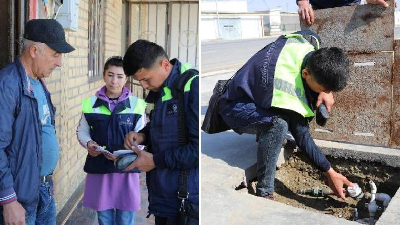 Umar Sharipov, a local resident of Alat town, talks to BST water inspectors. Bukhara region, Uzbekistan, 2022